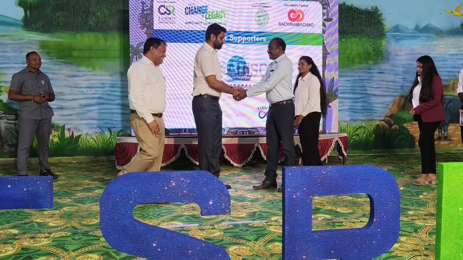 WhitePage Technologies founder Ghouse Pasha receiving recognition at the South India CSR Summit